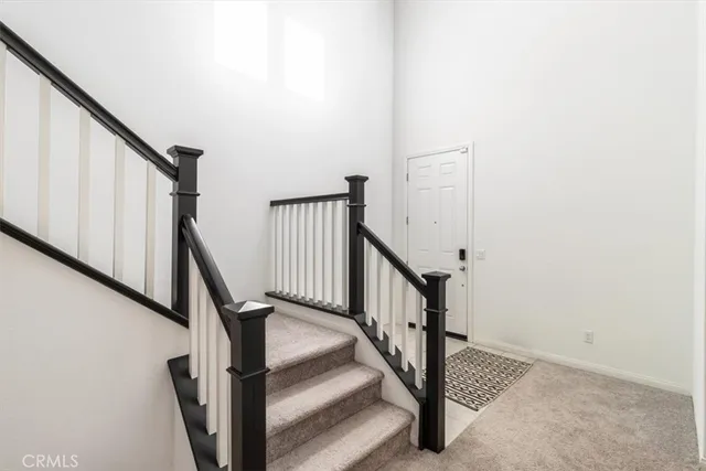 a front view of a house with garage
