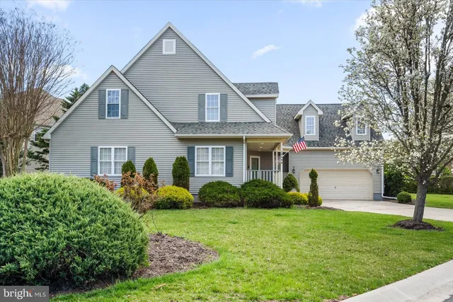 a view of a deck with wooden floor and fence