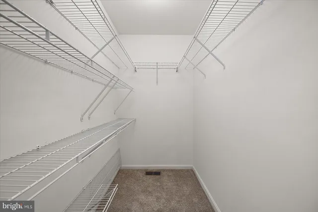 a view of a house with a back yard