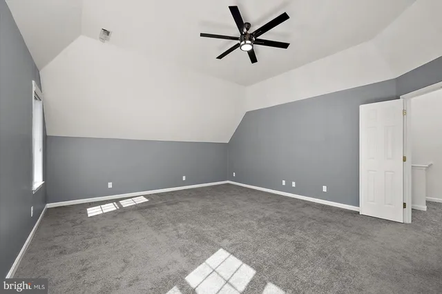 a view of swimming pool with outdoor seating and plants