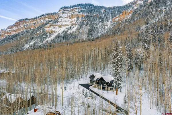 a view of a balcony with chair and table
