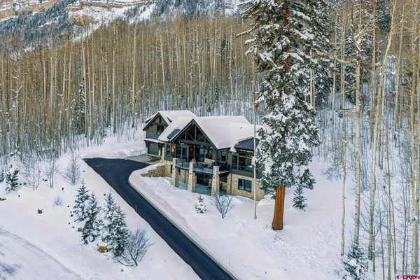 a terrace of a house with outdoor seating