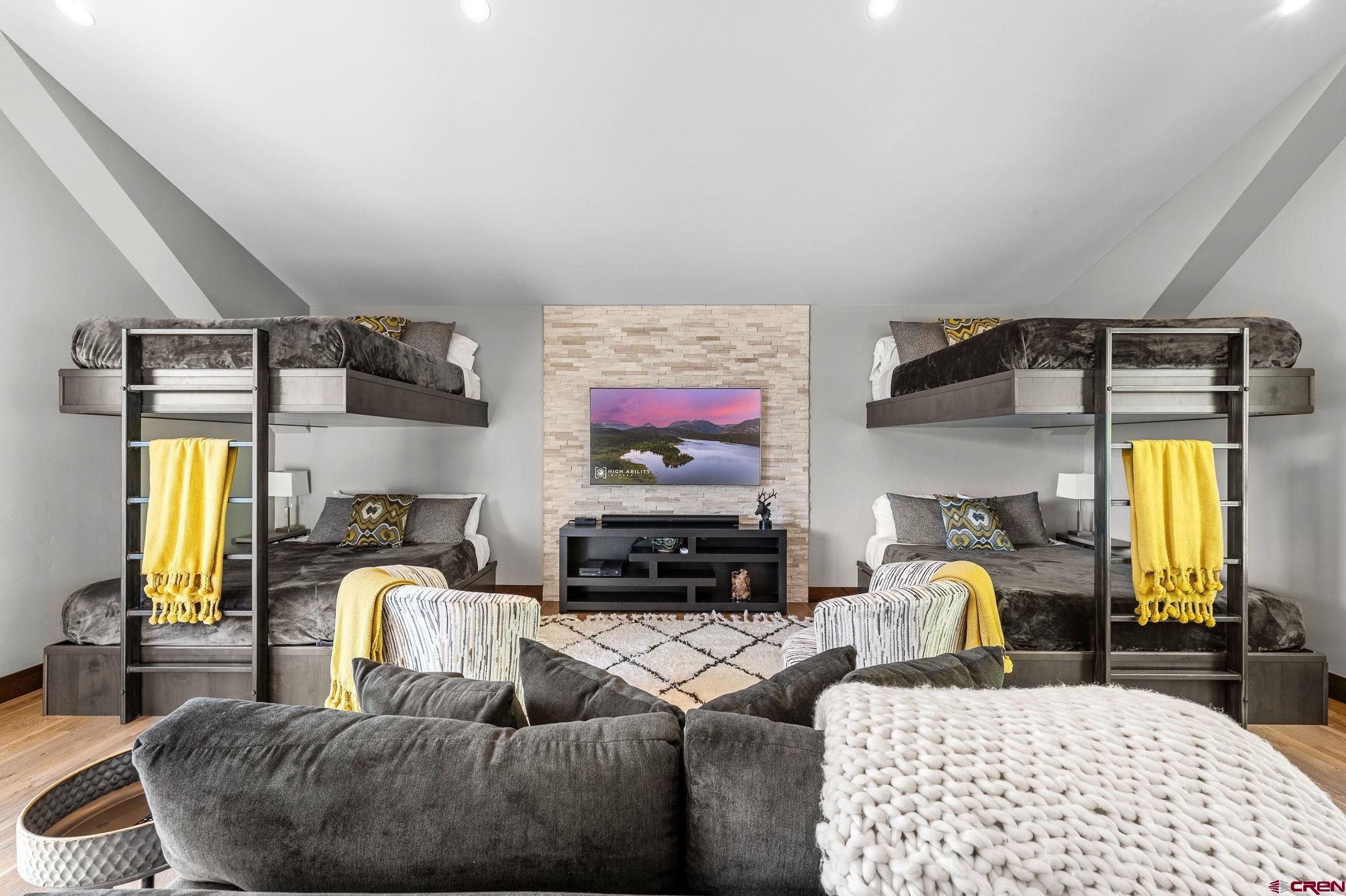 155 Long Story Road Durango, CO 81301 - Photo 29 of 45 a living room with furniture and a flat screen tv