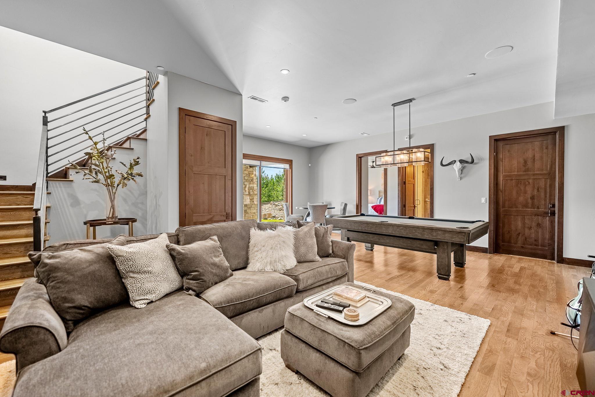 155 Long Story Road Durango, CO 81301 - Photo 4 of 45 a living room with furniture and a window