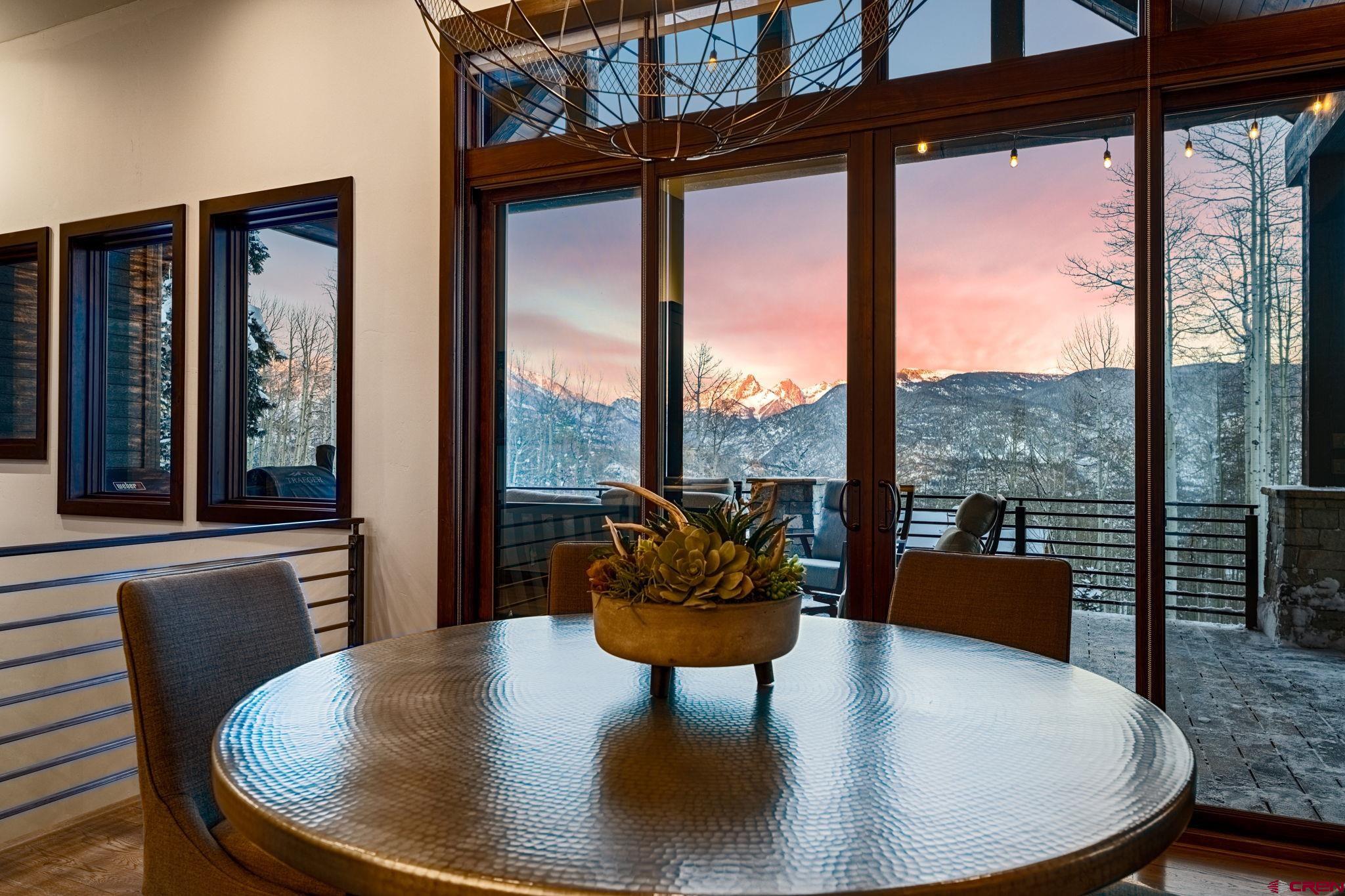 155 Long Story Road Durango, CO 81301 - Photo 41 of 45 a living room with furniture and a floor to ceiling window