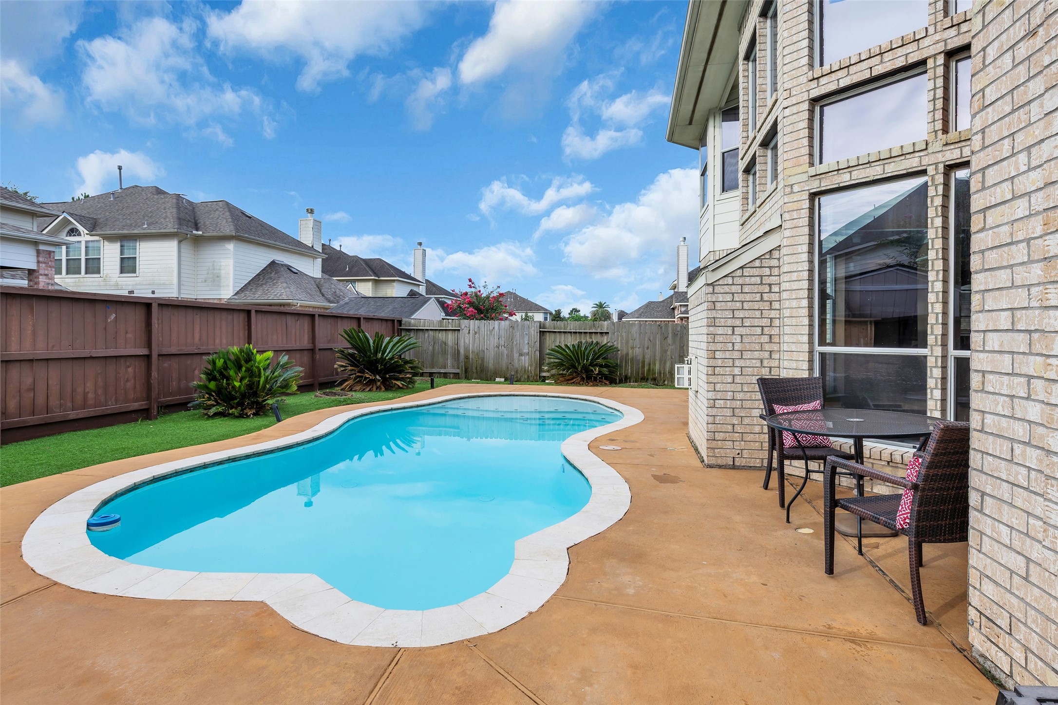 611 River Delta Lane Rosenberg, TX 77469 - Photo 38 of 39 a view of a swimming pool with back yard