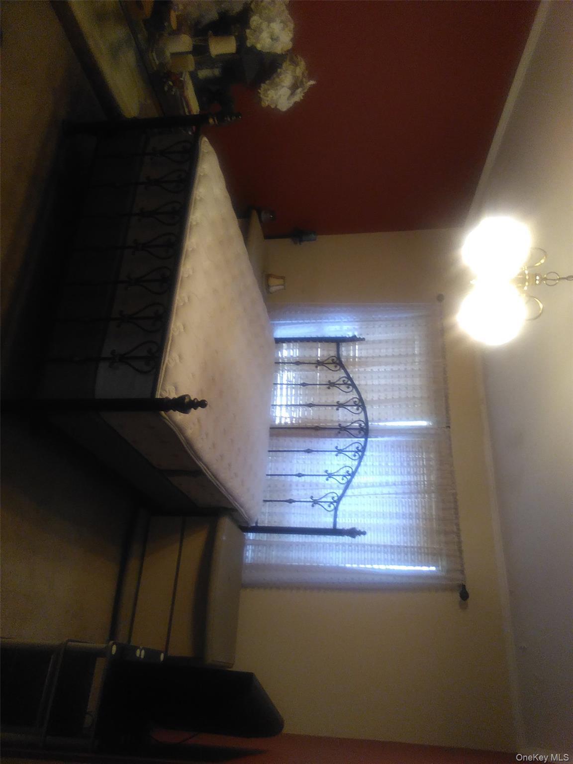 2032 Champlin Road Jefferson, NY 12093 - Photo 14 of 20 Bedroom with ornamental molding and a chandelier