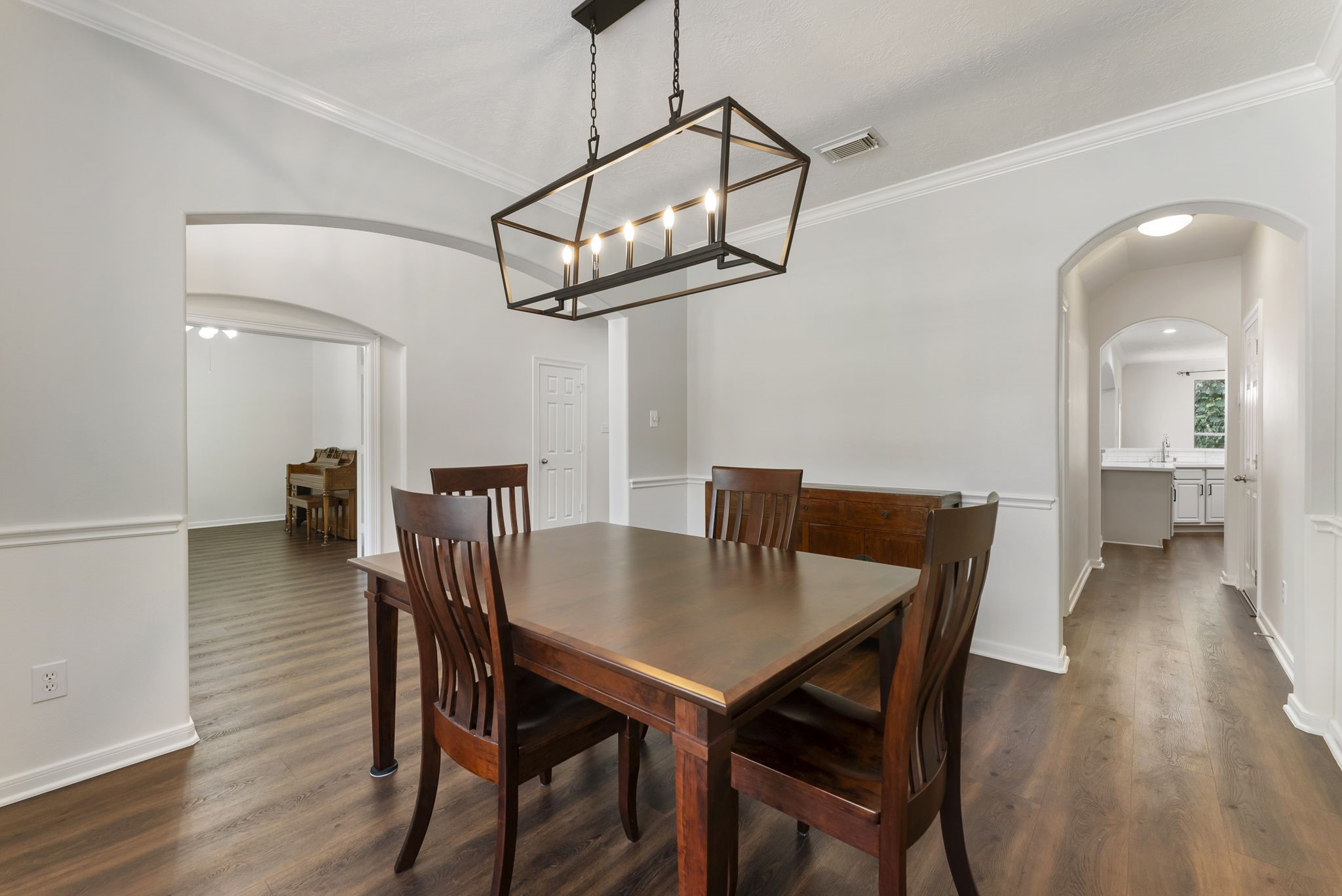 6643 Knollbridge Lane Spring, TX 77379 - Photo 7 of 50 The formal dining room conveniently connects to the kitchen making dinner parties a breeze.