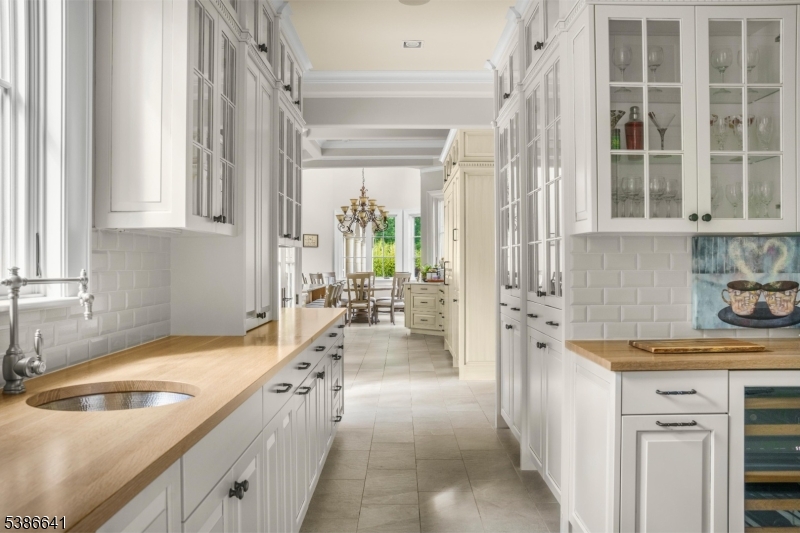 4 Mason Hill Road Warren, NJ 07059 - Photo 19 of 50 a kitchen with a sink and a stove top oven