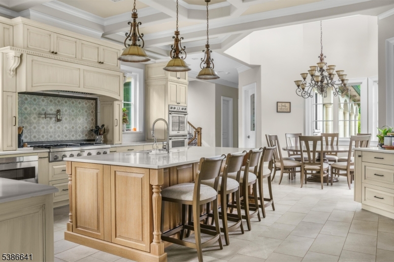 4 Mason Hill Road Warren, NJ 07059 - Photo 21 of 50 a large kitchen with a table and chairs in it