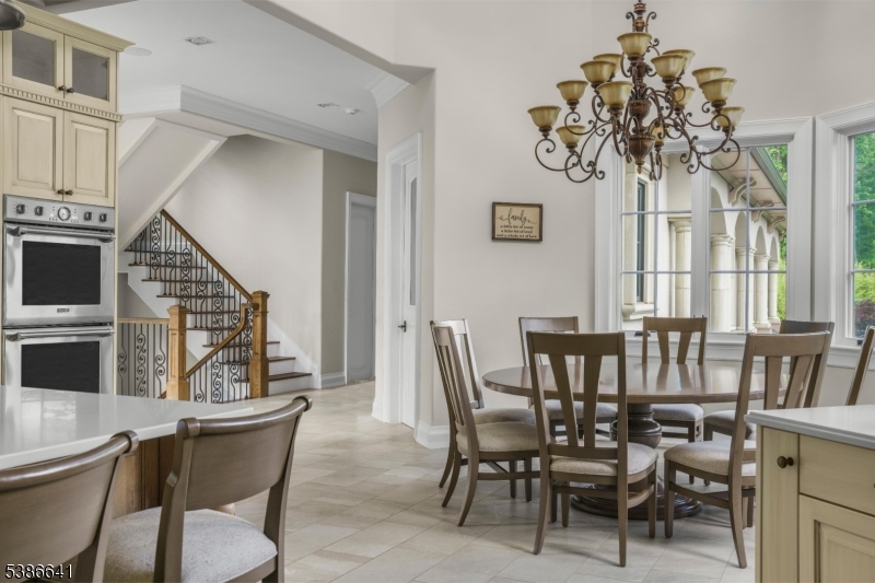 4 Mason Hill Road Warren, NJ 07059 - Photo 22 of 50 a view of a dining room with furniture window and wooden floor