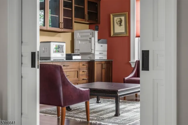 a view of a kitchen with seating area