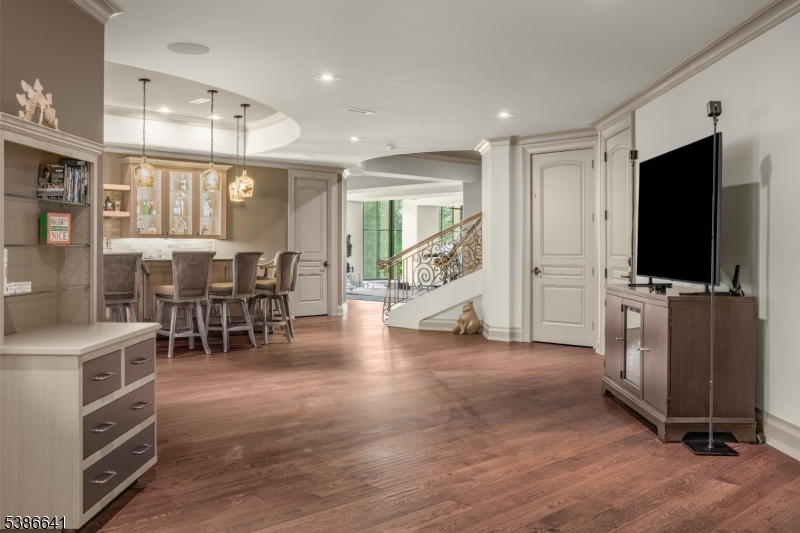 4 Mason Hill Road Warren, NJ 07059 - Photo 35 of 50 a living room with furniture and a flat screen tv