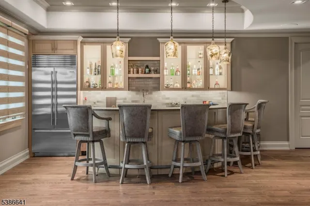 a view of a dining room with furniture and window