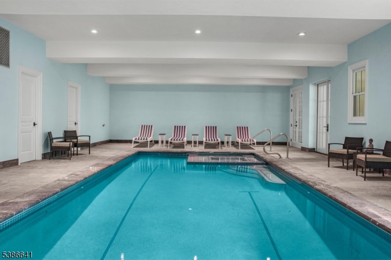 4 Mason Hill Road Warren, NJ 07059 - Photo 39 of 50 a living room with kitchen island furniture and a wooden floor