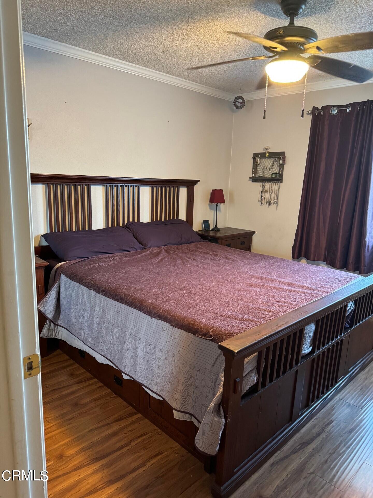 2193 Rhoda Street Simi Valley, CA 93065 - Photo 5 of 11 a bed sitting in a bedroom next to a window