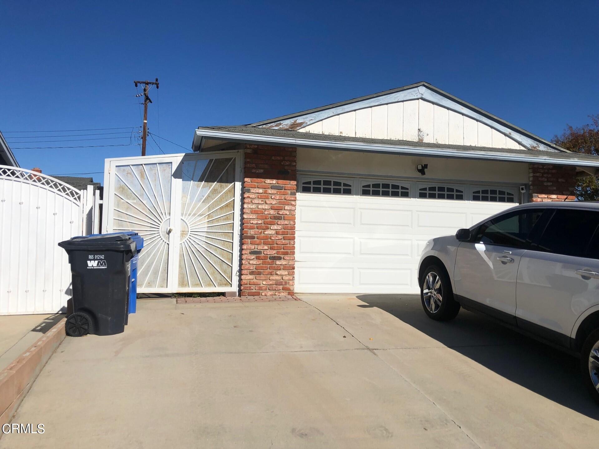 2193 Rhoda Street Simi Valley, CA 93065 - Photo 8 of 11 a view of a car in front of a house