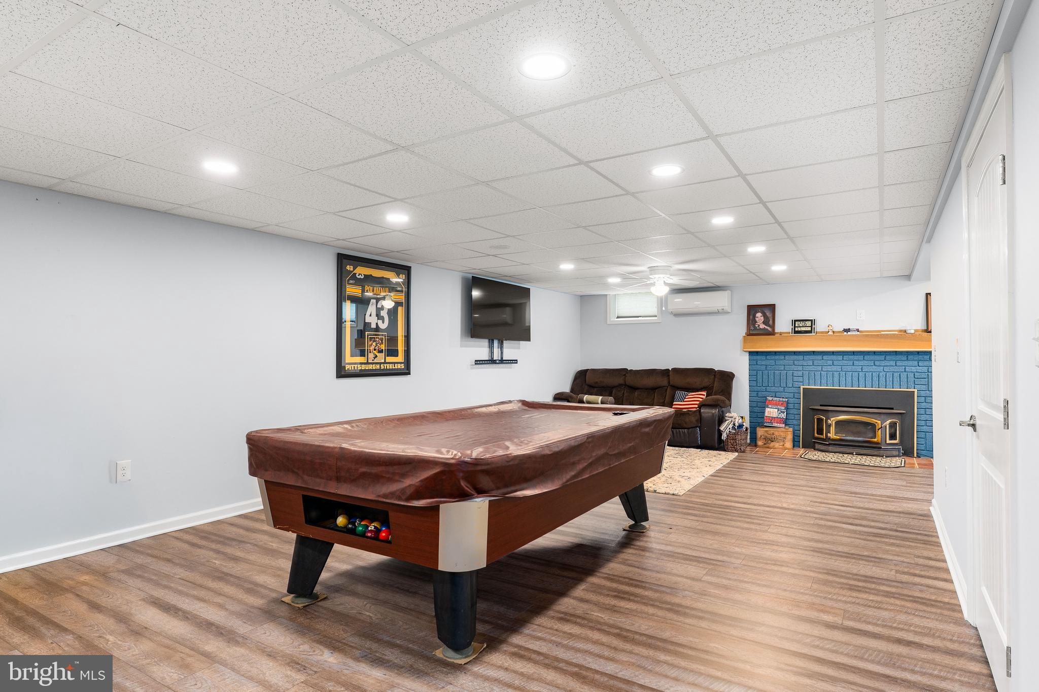 144 Bill Leight Road Conowingo, MD 21918 - Photo 19 of 28 a living room with stainless steel appliances furniture a fireplace and a table