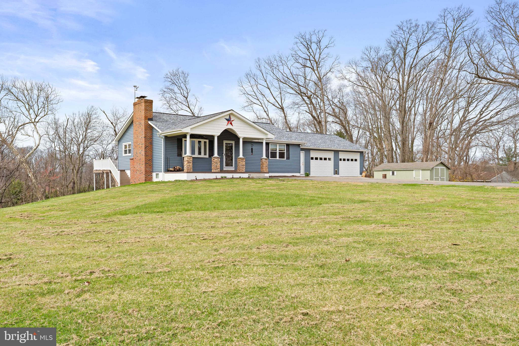 144 Bill Leight Road Conowingo, MD 21918 - Photo 4 of 28 a front view of a house with a yard