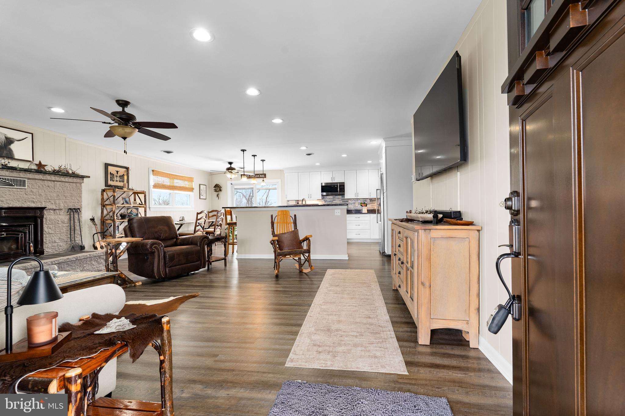 144 Bill Leight Road Conowingo, MD 21918 - Photo 5 of 28 a living room with furniture and a fireplace