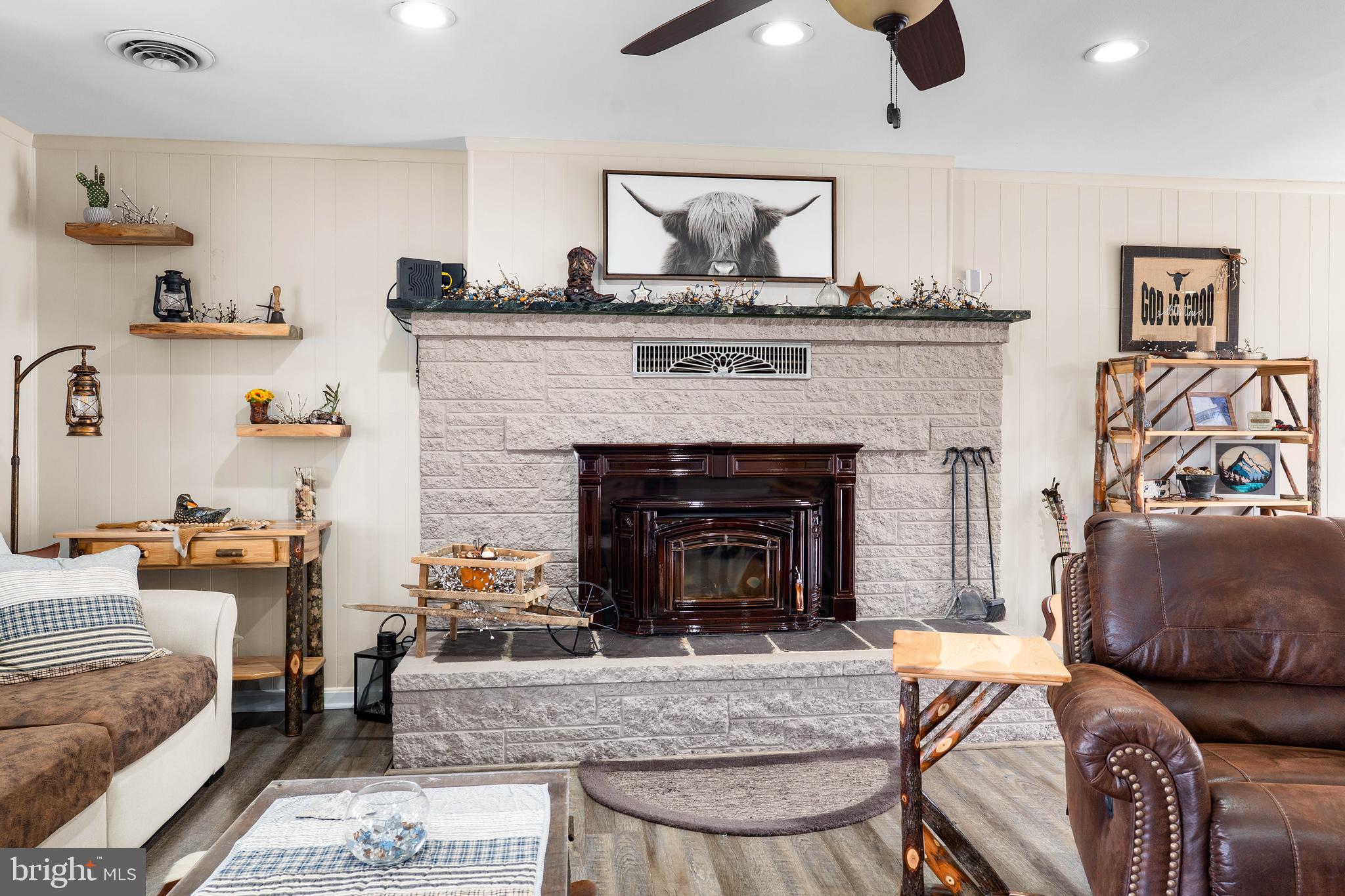 144 Bill Leight Road Conowingo, MD 21918 - Photo 6 of 28 a living room with furniture and a fireplace
