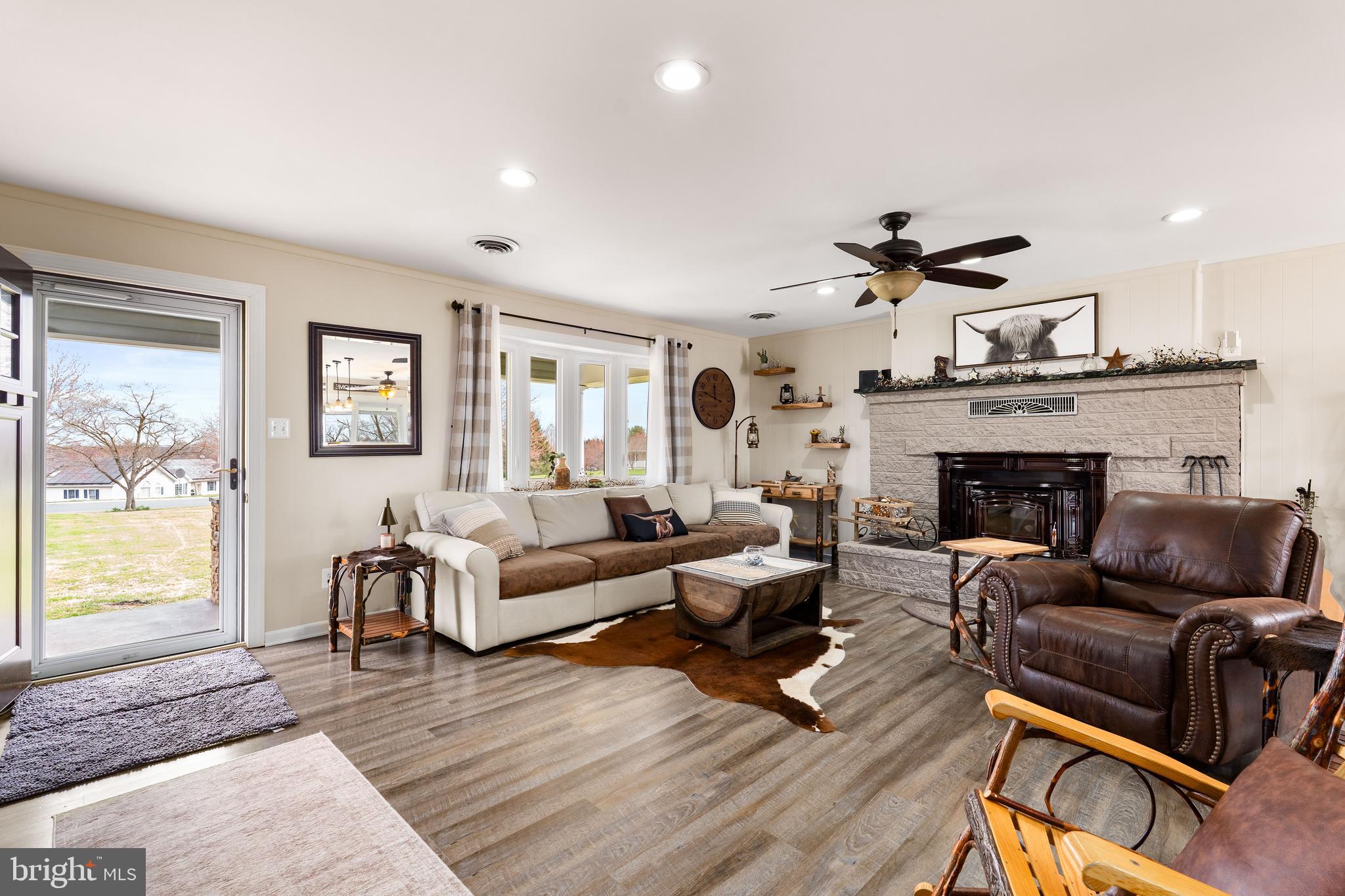 144 Bill Leight Road Conowingo, MD 21918 - Photo 7 of 28 a living room with furniture and a fireplace