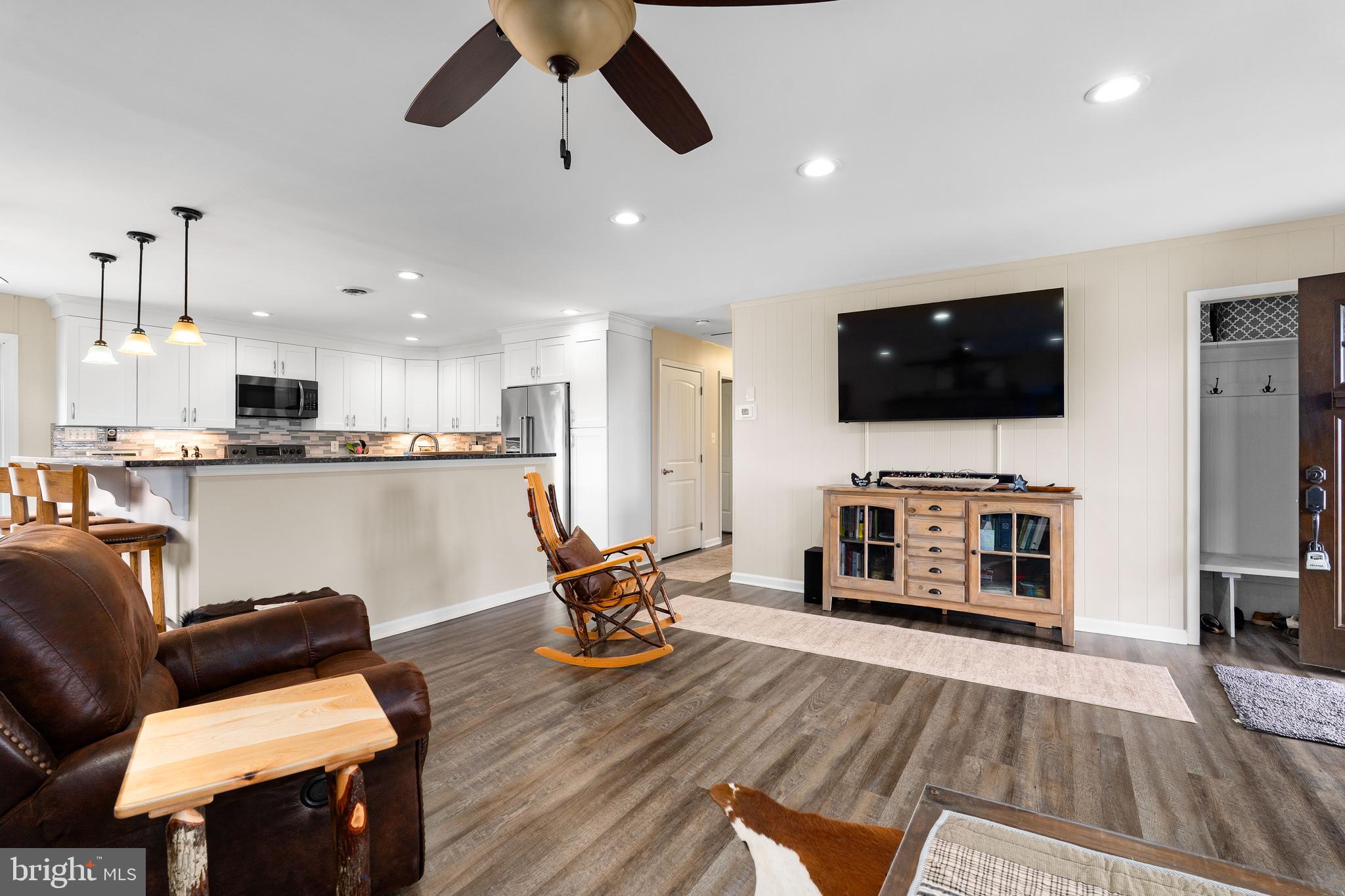 144 Bill Leight Road Conowingo, MD 21918 - Photo 28 of 28 a living room with furniture and a flat screen tv