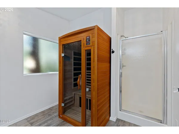 a bed room with a bed and a television