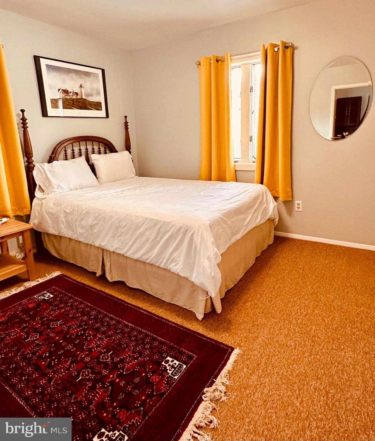 1813 Olmstead Drive Falls Church, VA 22043 - Photo 8 of 14 a bedroom with a bed and painting on the wall