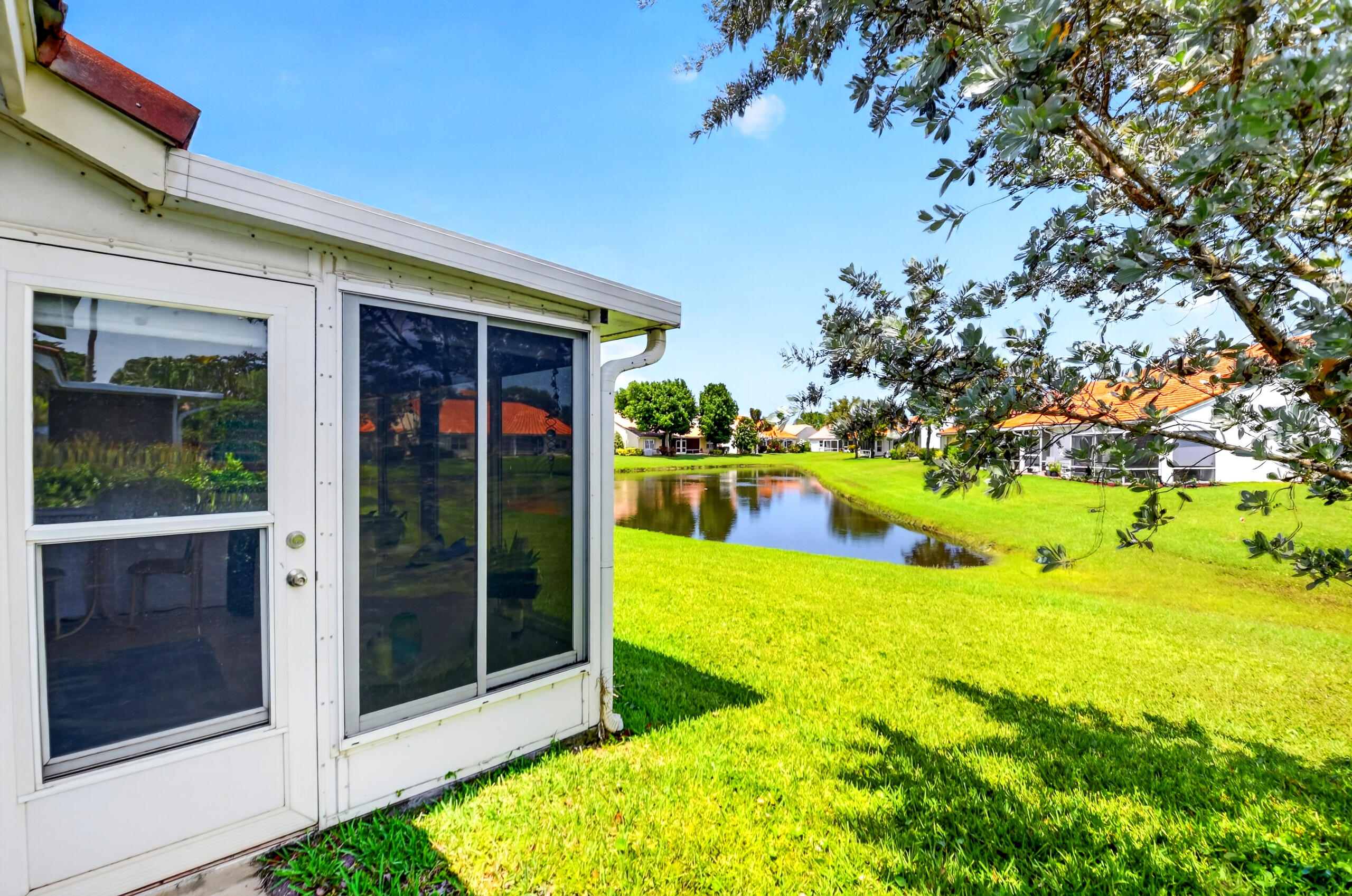 15340 Floral Club Road Delray Beach, FL 33484 - Photo 34 of 42 a view of a house with backyard