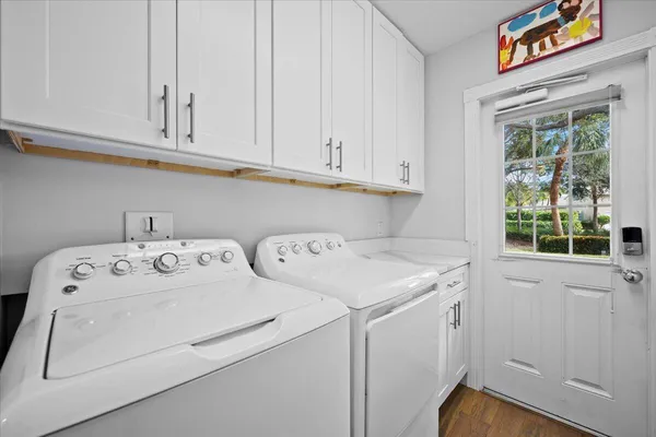 a utility room with dryer and washer