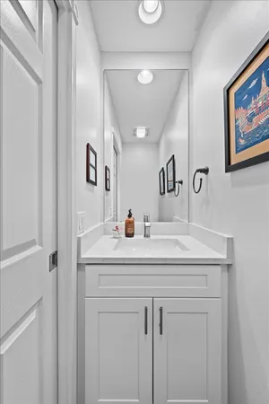 a spacious bedroom with a bed and a large window