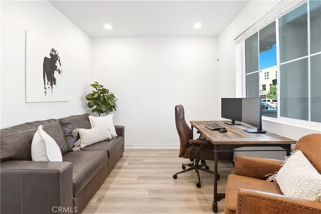 a living room with furniture and a table