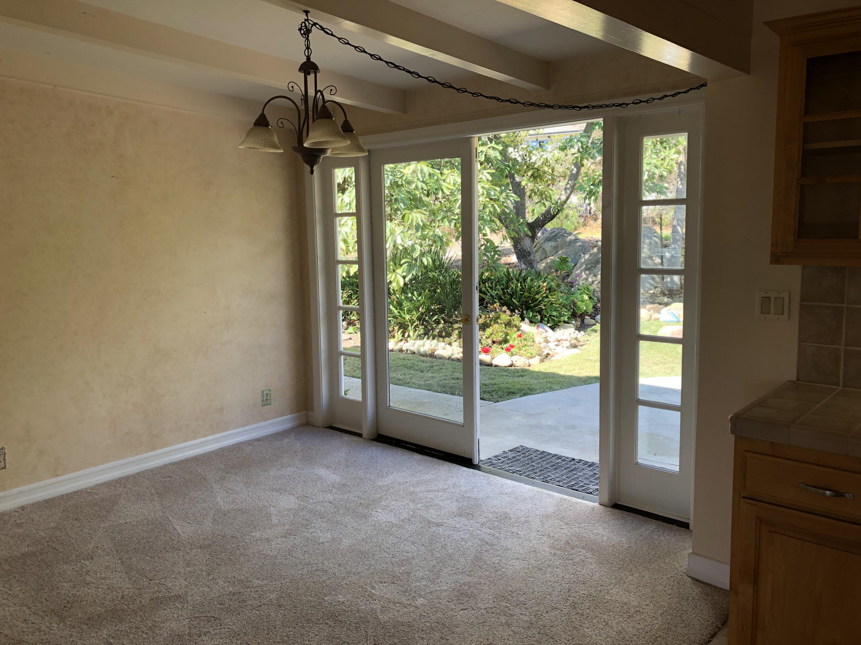 3910 Foothill Road Carpinteria, CA 93013 - Photo 4 of 6 Dining Doors to Patio