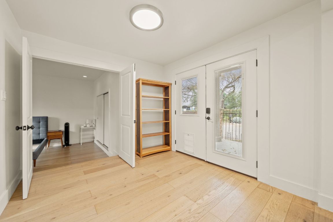 912 Mansell Avenue Austin, TX 78702 - Photo 18 of 37 wooden floor and an empty room