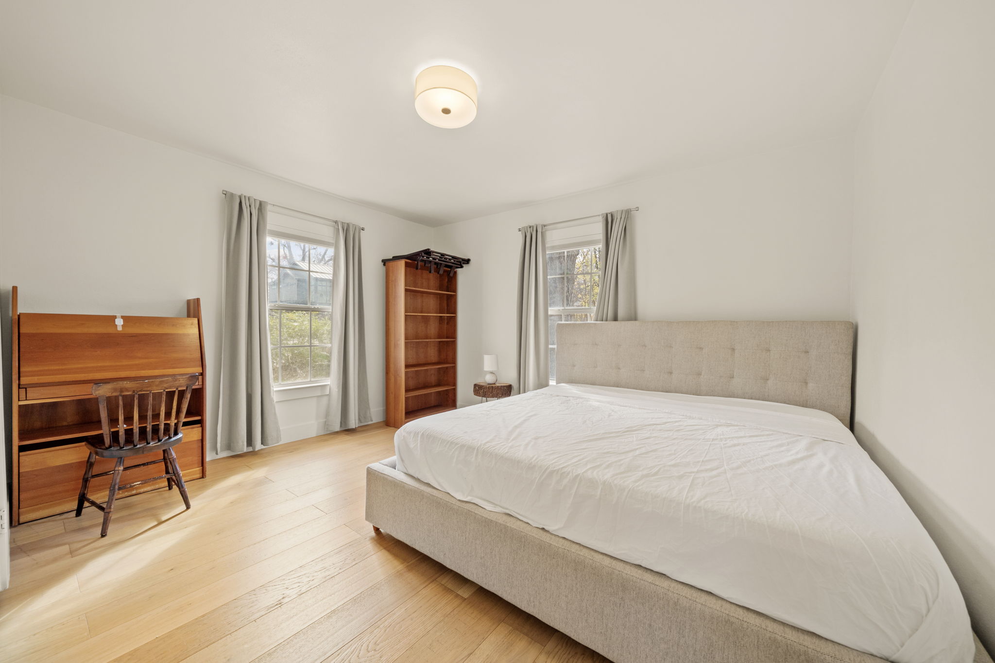 912 Mansell Avenue Austin, TX 78702 - Photo 26 of 37 Bedroom with hardwood / wood-style flooring