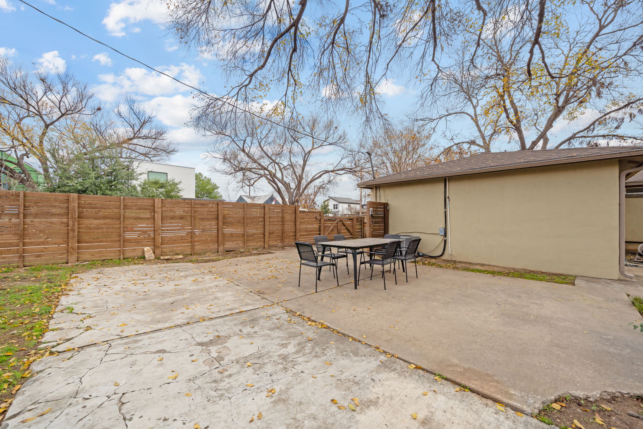 912 Mansell Avenue Austin, TX 78702 - Photo 35 of 37 Fenced backyard with a patio