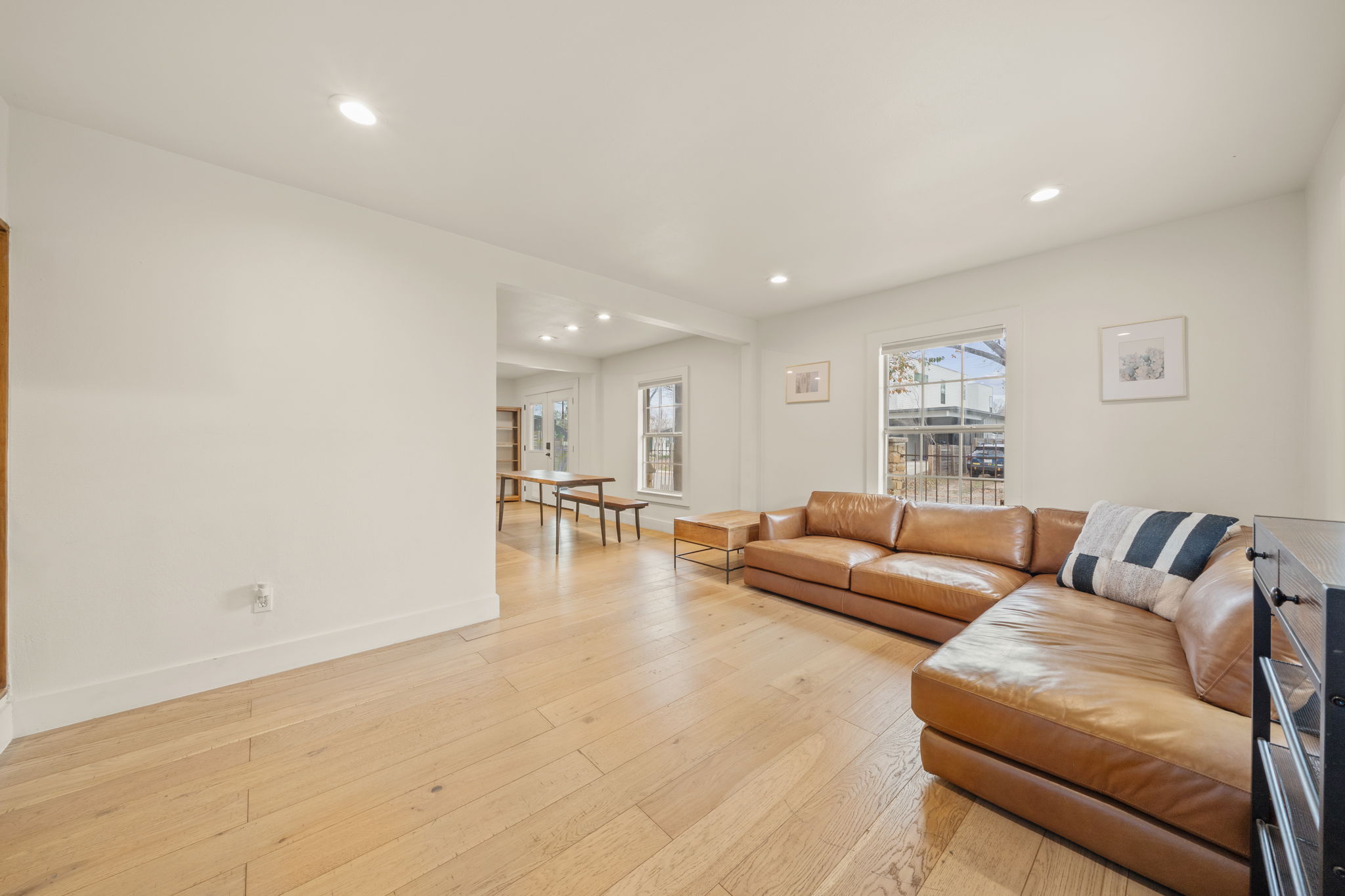 912 Mansell Avenue Austin, TX 78702 - Photo 8 of 37 Living room featuring recessed lighting and light wood-type flooring