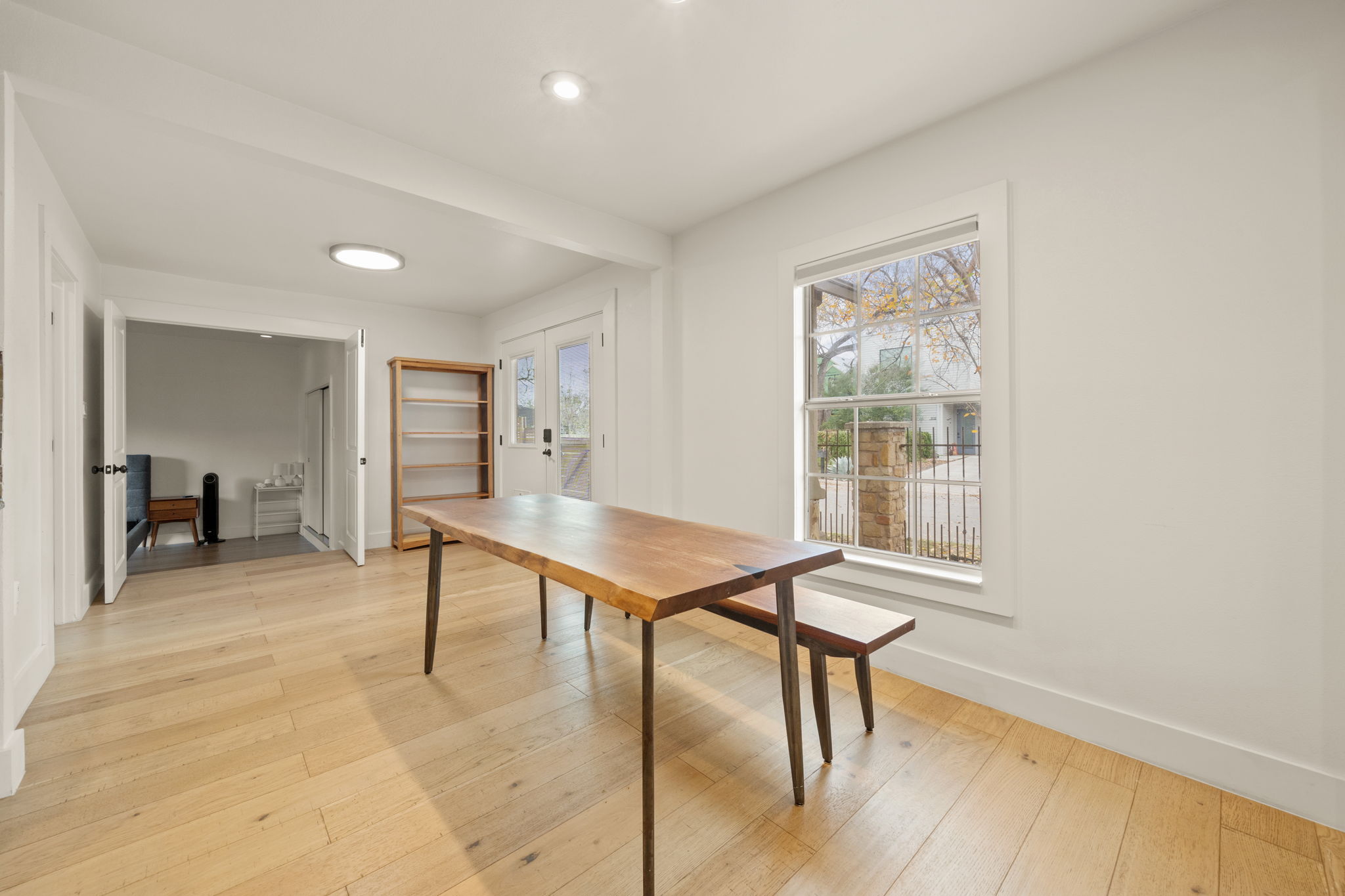 912 Mansell Avenue Austin, TX 78702 - Photo 10 of 37 Dining area featuring light wood-style flooring and plenty of natural light