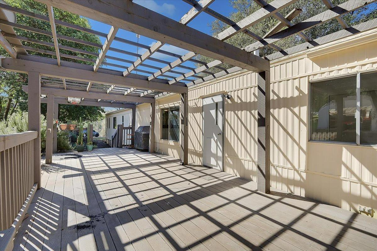 23003 Pleasant Valley Road North San Juan, CA 95960 - Photo 2 of 47 a view of a porch with wooden floor