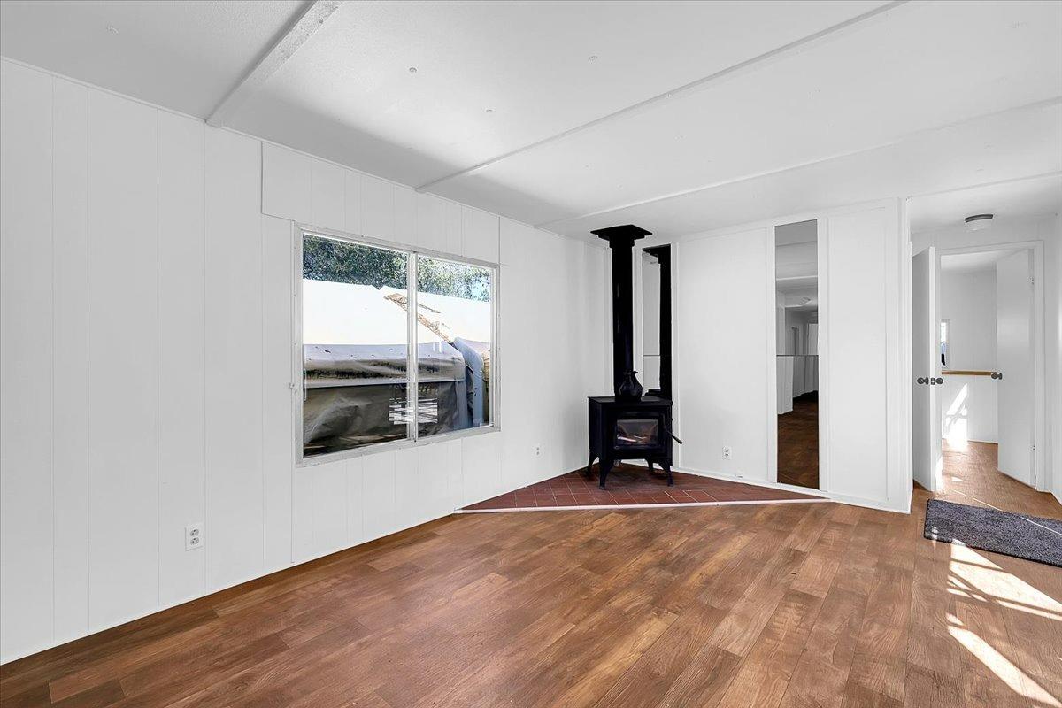 23003 Pleasant Valley Road North San Juan, CA 95960 - Photo 5 of 47 wooden floor in an empty room with a window
