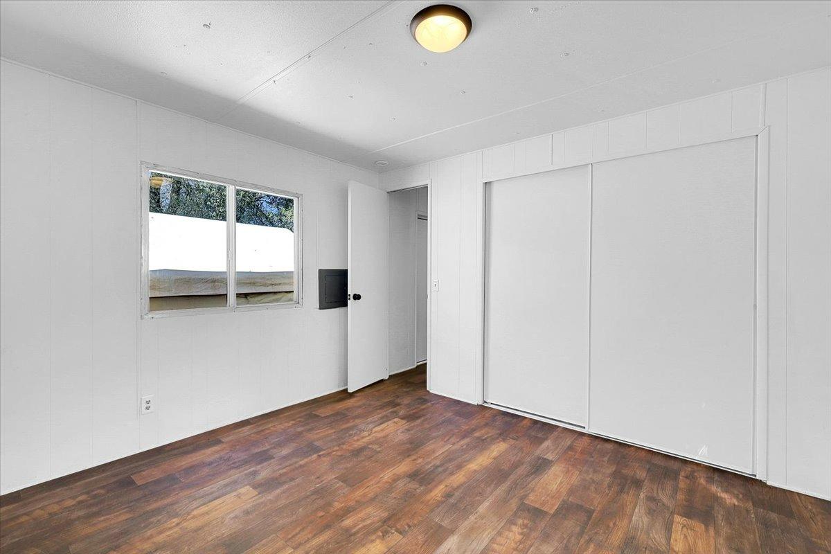 23003 Pleasant Valley Road North San Juan, CA 95960 - Photo 8 of 47 an empty room with wooden floor and windows