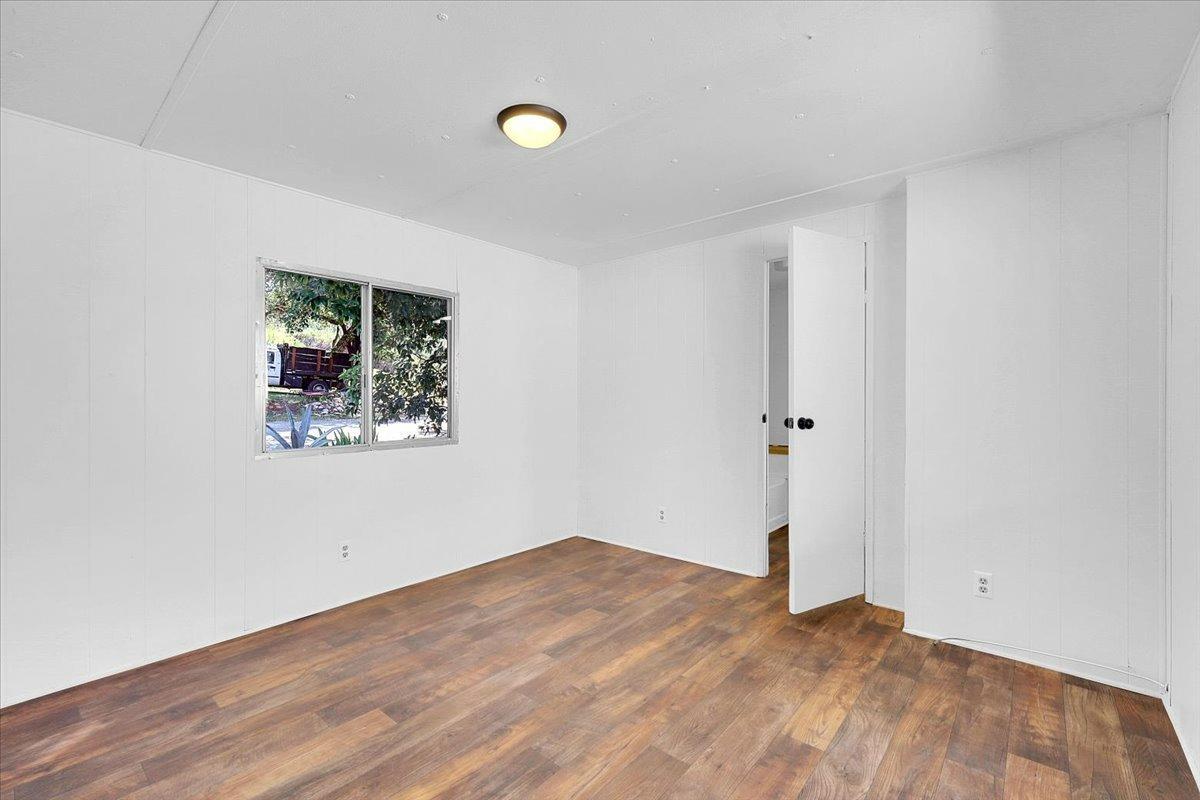 23003 Pleasant Valley Road North San Juan, CA 95960 - Photo 9 of 47 an empty room with a window and closet
