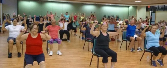 a store room filled with lots of fruit and vegetables