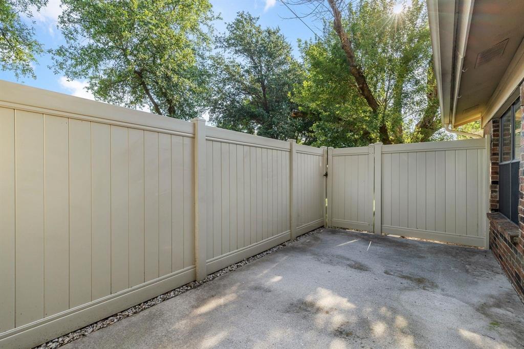 2240 Tarpley Road, Unit 484 Carrollton, TX 75006 - Photo 17 of 20 a view of a backyard