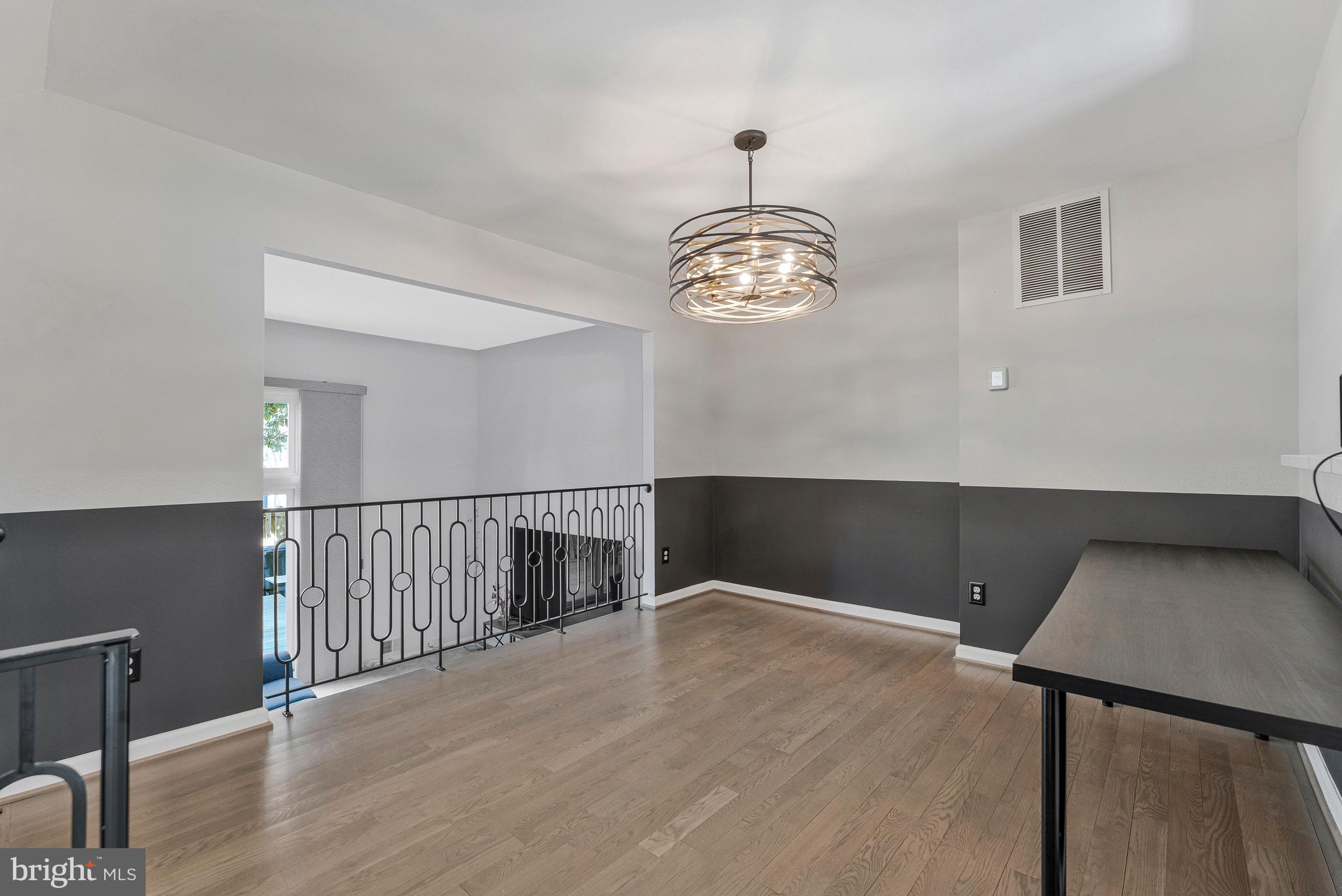 11852 St Trinians Court Reston, VA 20191 - Photo 10 of 48 Dining room w/ custom wrought iron railing
