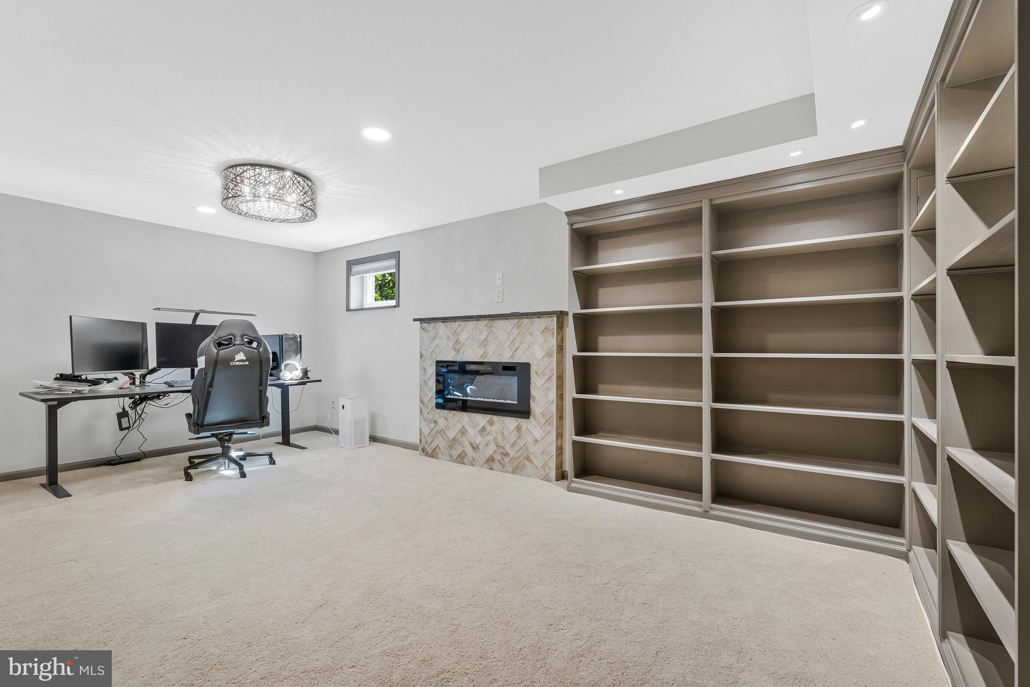 11852 St Trinians Court Reston, VA 20191 - Photo 14 of 48 Family room w/ built-ins and electric fireplace