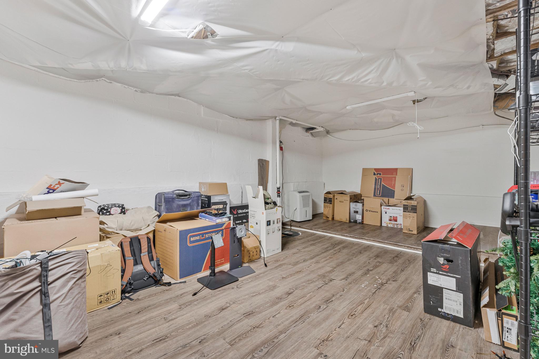 11852 St Trinians Court Reston, VA 20191 - Photo 18 of 48 Huge storage room w/ vinyl flooring