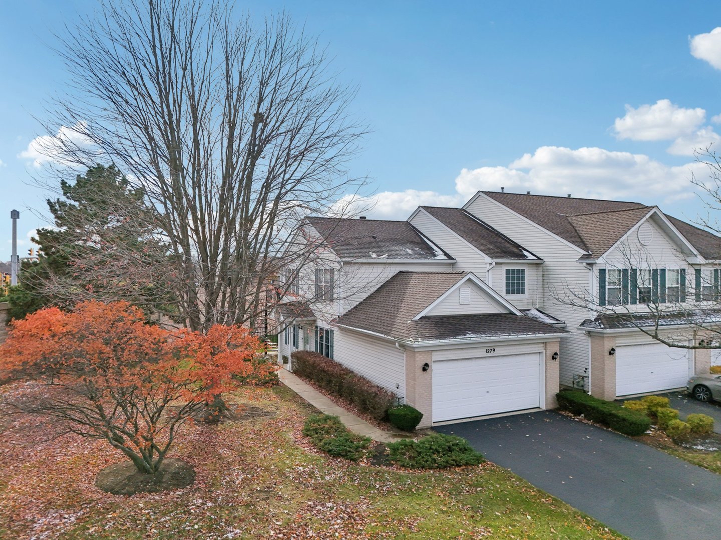 1279 Merrimack Court Crystal Lake, IL 60014 - Photo 25 of 27 a view of a house with a yard