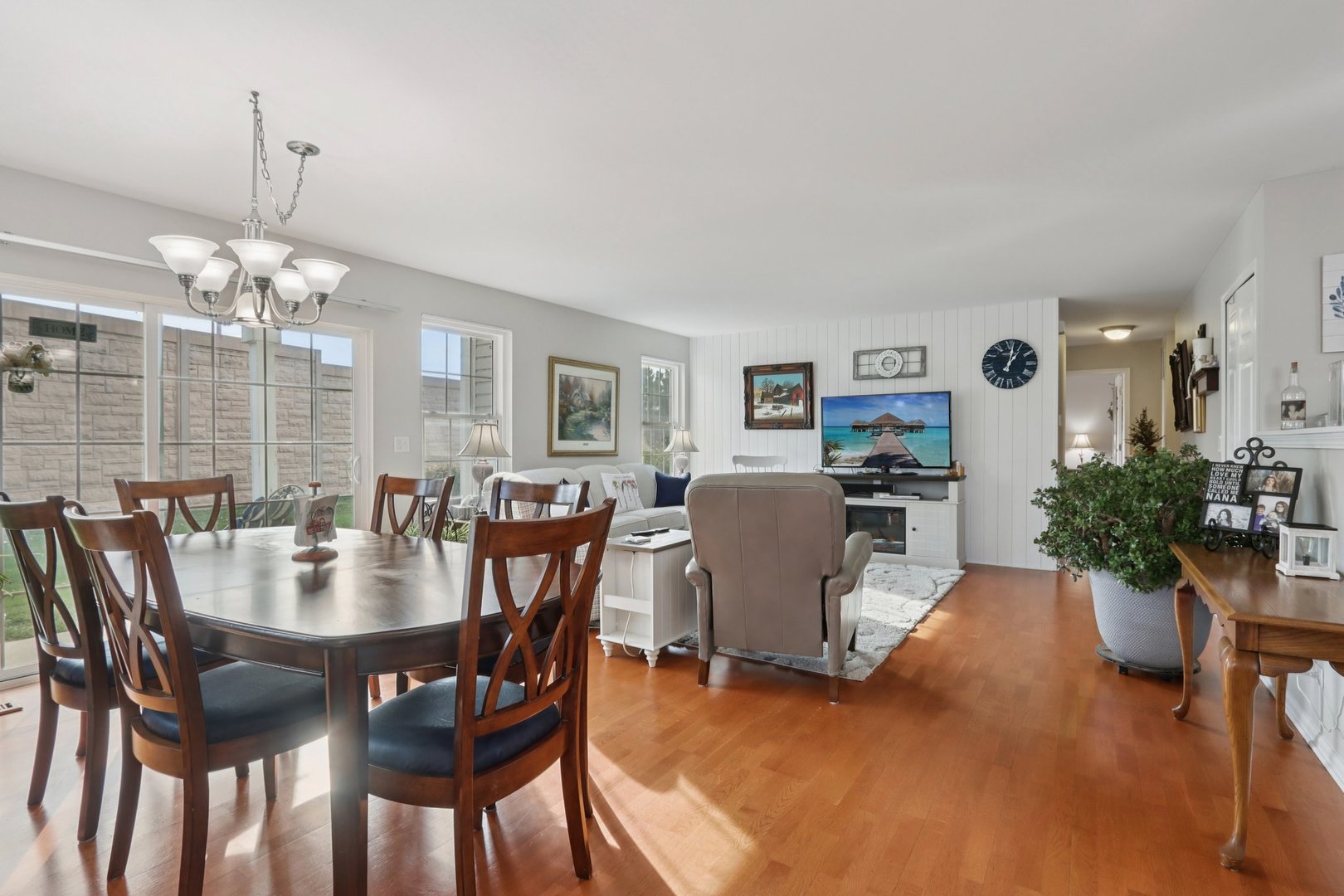 1279 Merrimack Court Crystal Lake, IL 60014 - Photo 5 of 27 a view of a dining room with furniture and wooden floor